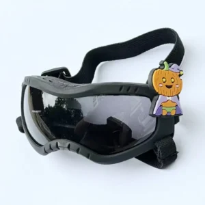 Military green pet goggles with funny Halloween monster accessory, UV protection.