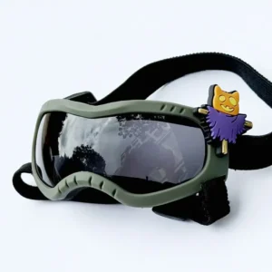 Army green tactical style dog goggles with a small bat charm for Halloween costume.