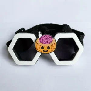 Trendy white hexagonal frame dog sunglasses with spooky pumpkin brain charm.